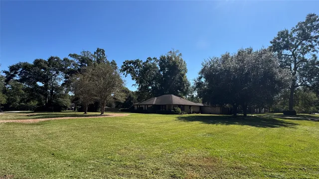 a view of swimming pool with an outdoor space and seating area