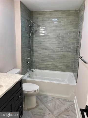 a view of an empty room with shelves