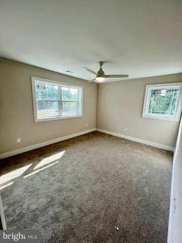 a house with trees in front of it