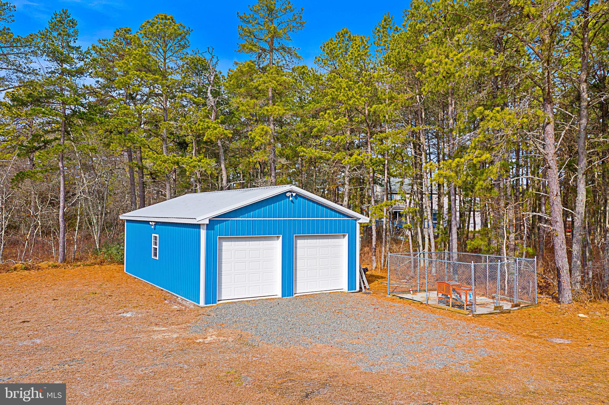 11 2nd Street Chatsworth, NJ 08019 - Photo 38 of 85 a house with trees in front of it