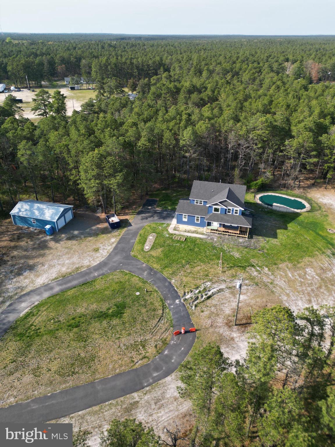 11 2nd Street Chatsworth, NJ 08019 - Photo 47 of 85 an aerial view of a house with a yard basket ball court and outdoor seating