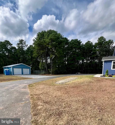 a large kitchen with stainless steel appliances kitchen island a stove a refrigerator a sink dishwasher with a oven and cabinets