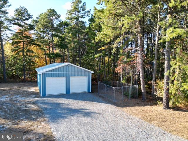 11 2nd Street Chatsworth, NJ 08019 - Photo 73 of 85 a front view of a house with a yard