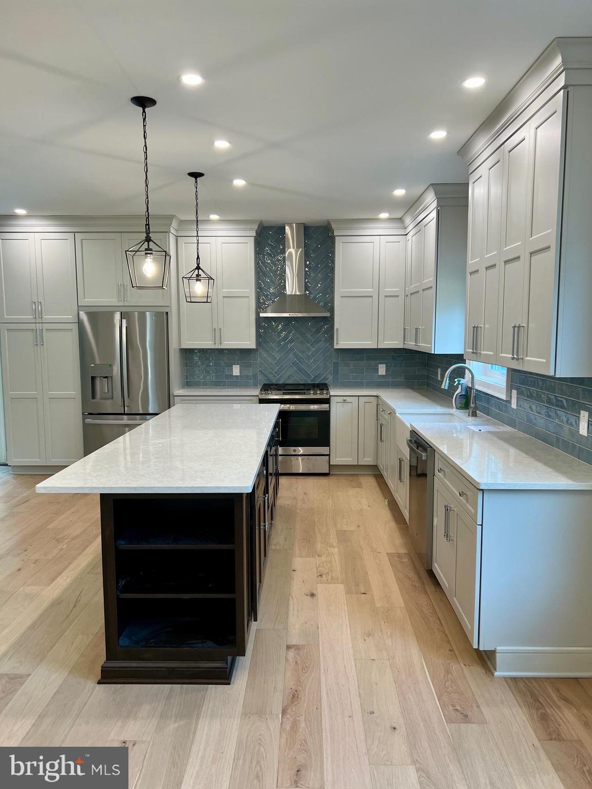 11 2nd Street Chatsworth, NJ 08019 - Photo 9 of 85 a large kitchen with stainless steel appliances kitchen island granite countertop a sink and a stove