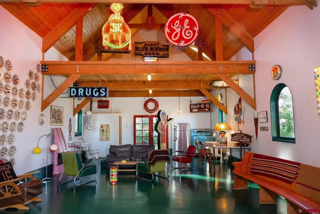 a view of dinning table with chairs in entryway