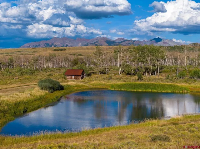 a view of a lake with a mountain