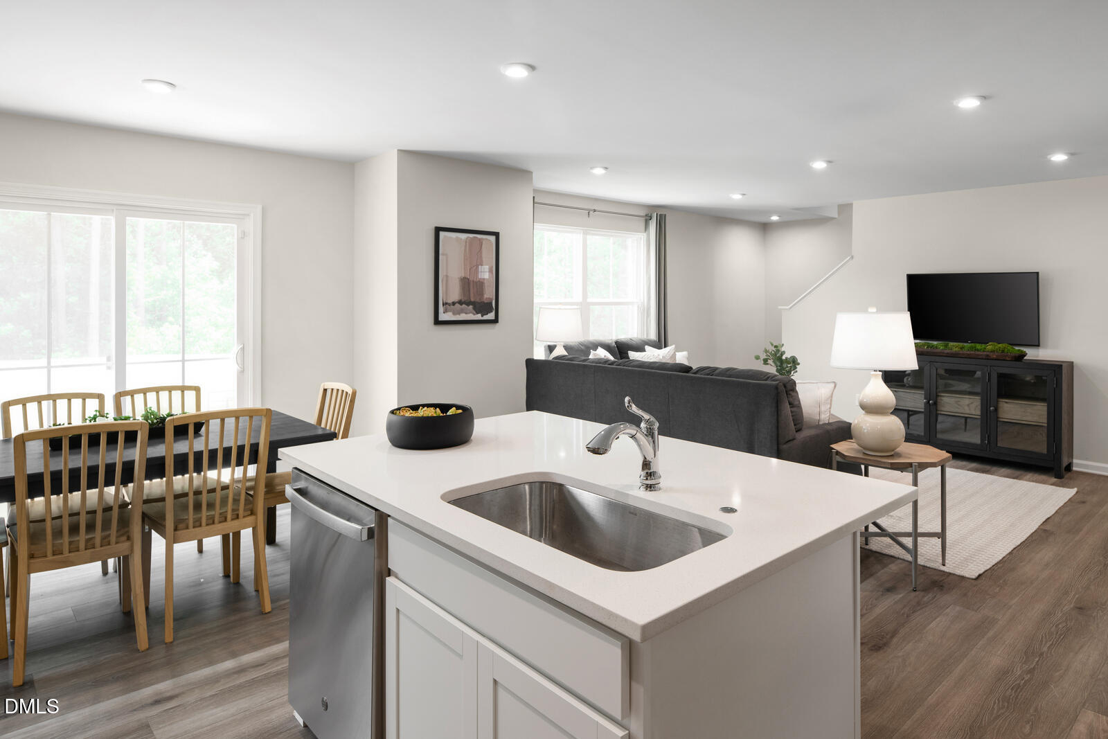 132 Cavalier Rider Run Wendell, NC 27591 - Photo 6 of 24 a kitchen with a sink a table and chairs