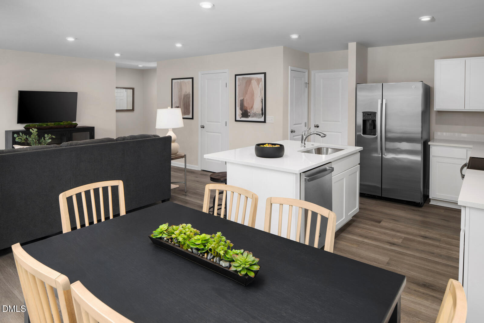 132 Cavalier Rider Run Wendell, NC 27591 - Photo 9 of 24 a living room with furniture and a flat screen tv