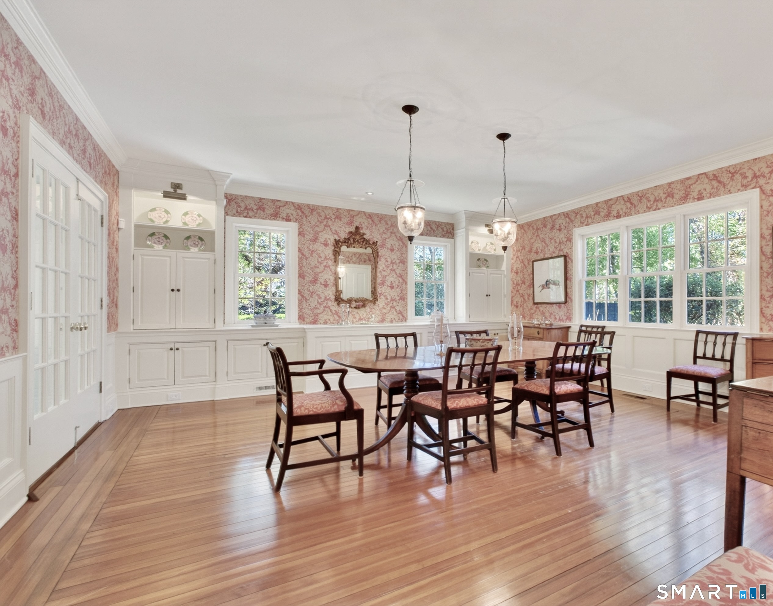 41 Peaceable Street Ridgefield, CT 06877 - Photo 18 of 40 a view of a dining room with furniture window and wooden floor