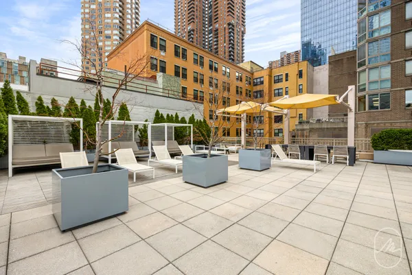 a view of a building with sitting area