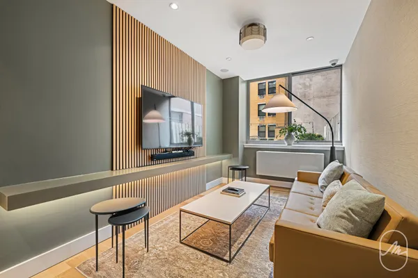 a kitchen with a table and chairs in it