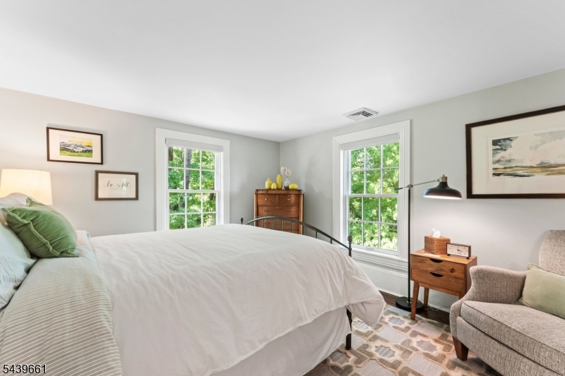 29 Bedens Brook Road Skillman, NJ 08558 - Photo 35 of 50 a spacious bedroom with a bed and a couch