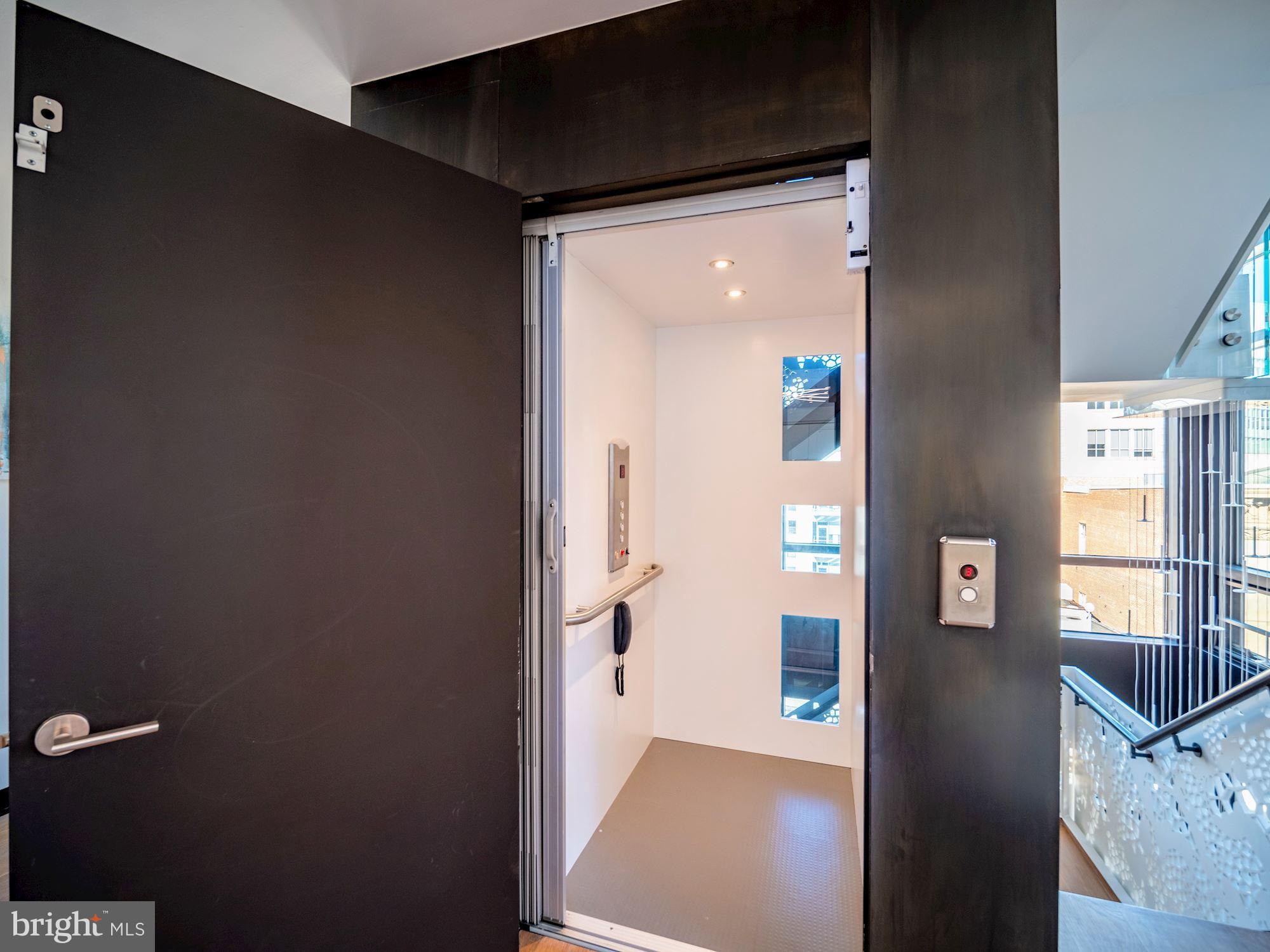 912 F Street Northwest, Unit 905 Washington, DC 20004 - Photo 9 of 54 Internal elevator to all 4 floors