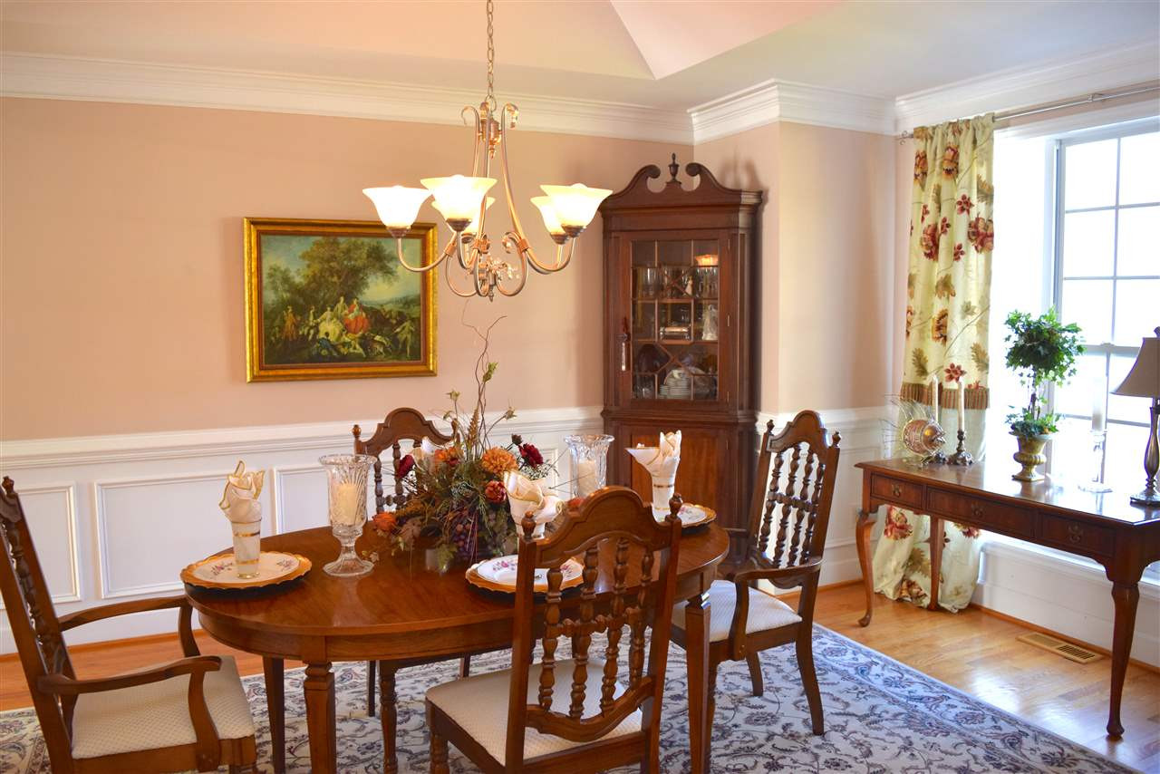 620 Middle Bridge Road Wake Forest, NC 27587 - Photo 8 of 25 Dining Room has lots of natural light and has lots of room for all your furniture pieces. Dining Room