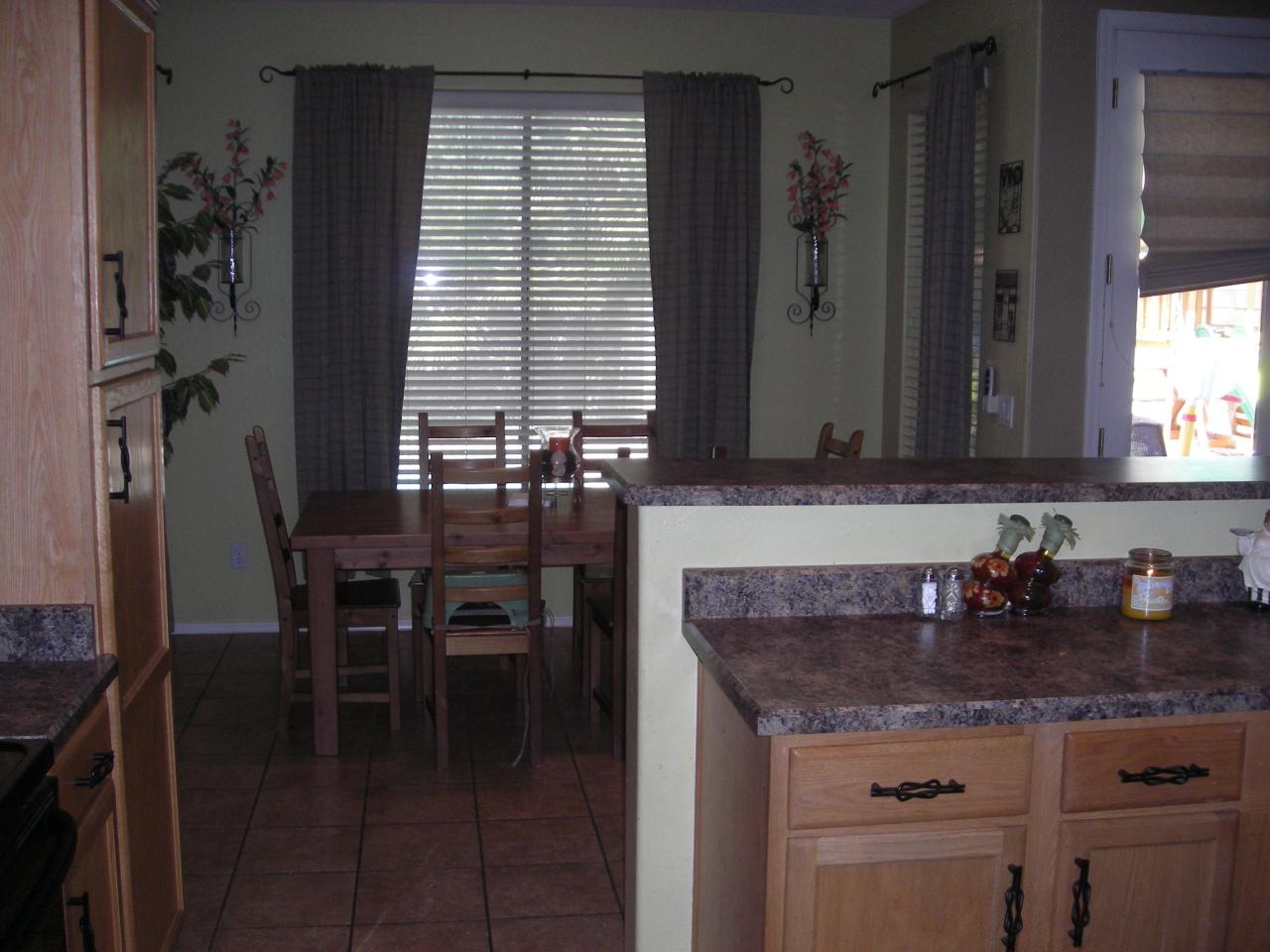 3250 East Hampton Lane Gilbert, AZ 85295 - Photo 5 of 11 Kitchen open to family room.