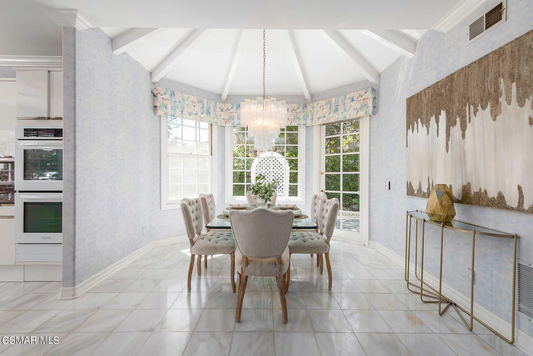 5467 Wellesley Drive Calabasas, CA 91302 - Photo 12 of 60 a dining room with furniture and window