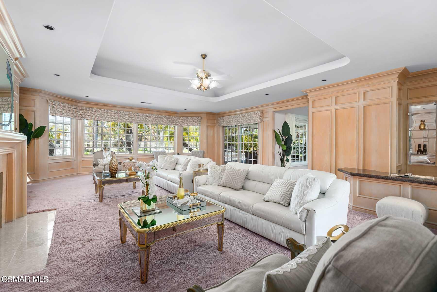 5467 Wellesley Drive Calabasas, CA 91302 - Photo 16 of 60 a living room with furniture and a large window