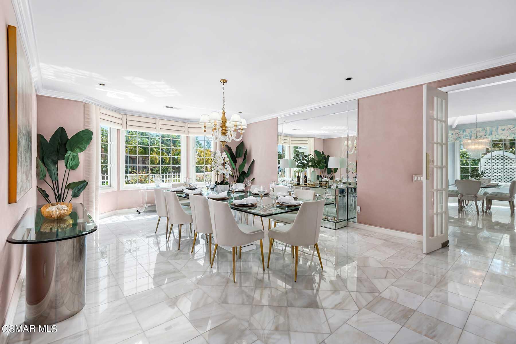5467 Wellesley Drive Calabasas, CA 91302 - Photo 19 of 60 a view of a dining room with furniture window and outside view