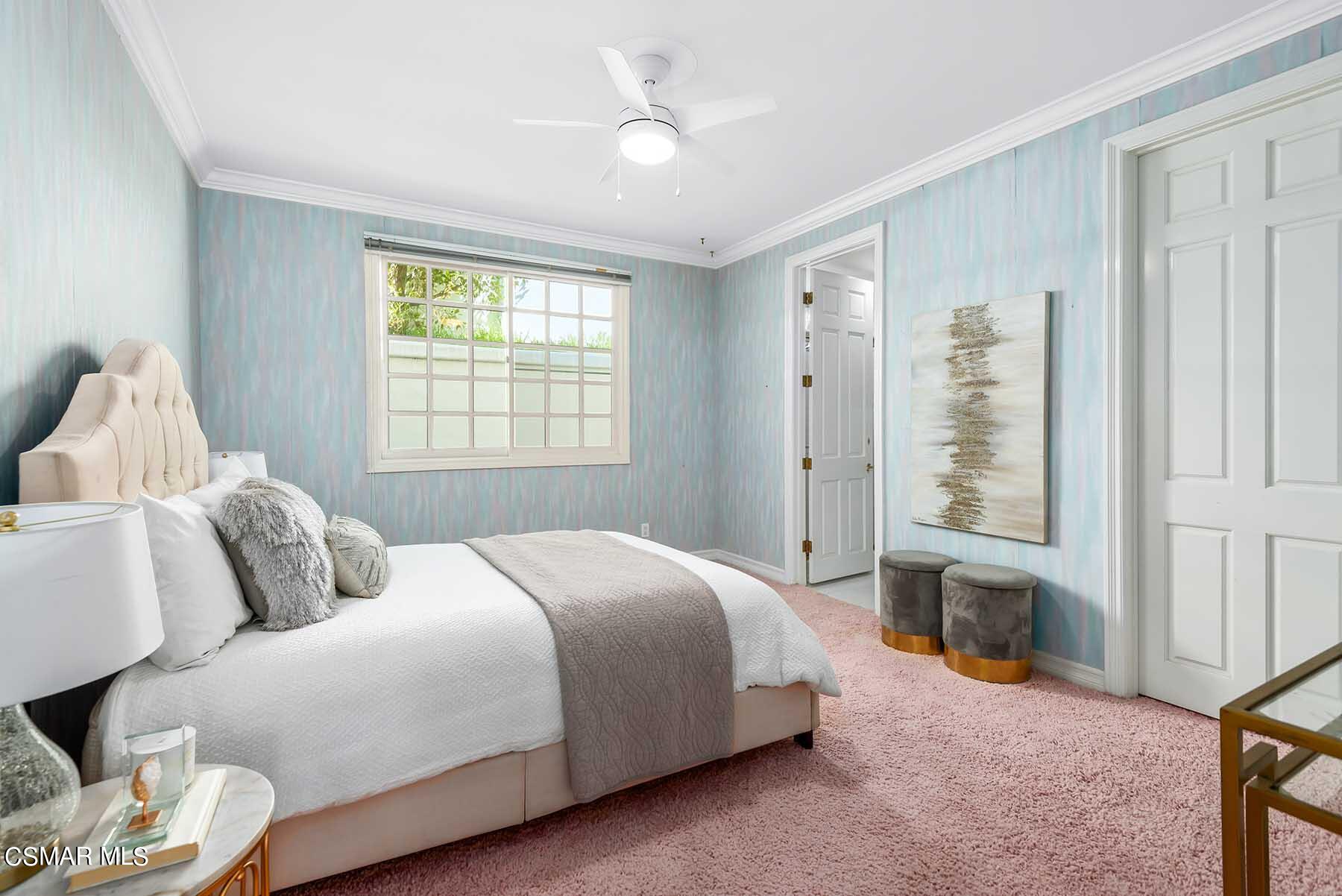 5467 Wellesley Drive Calabasas, CA 91302 - Photo 22 of 60 a bedroom with a bed and a window