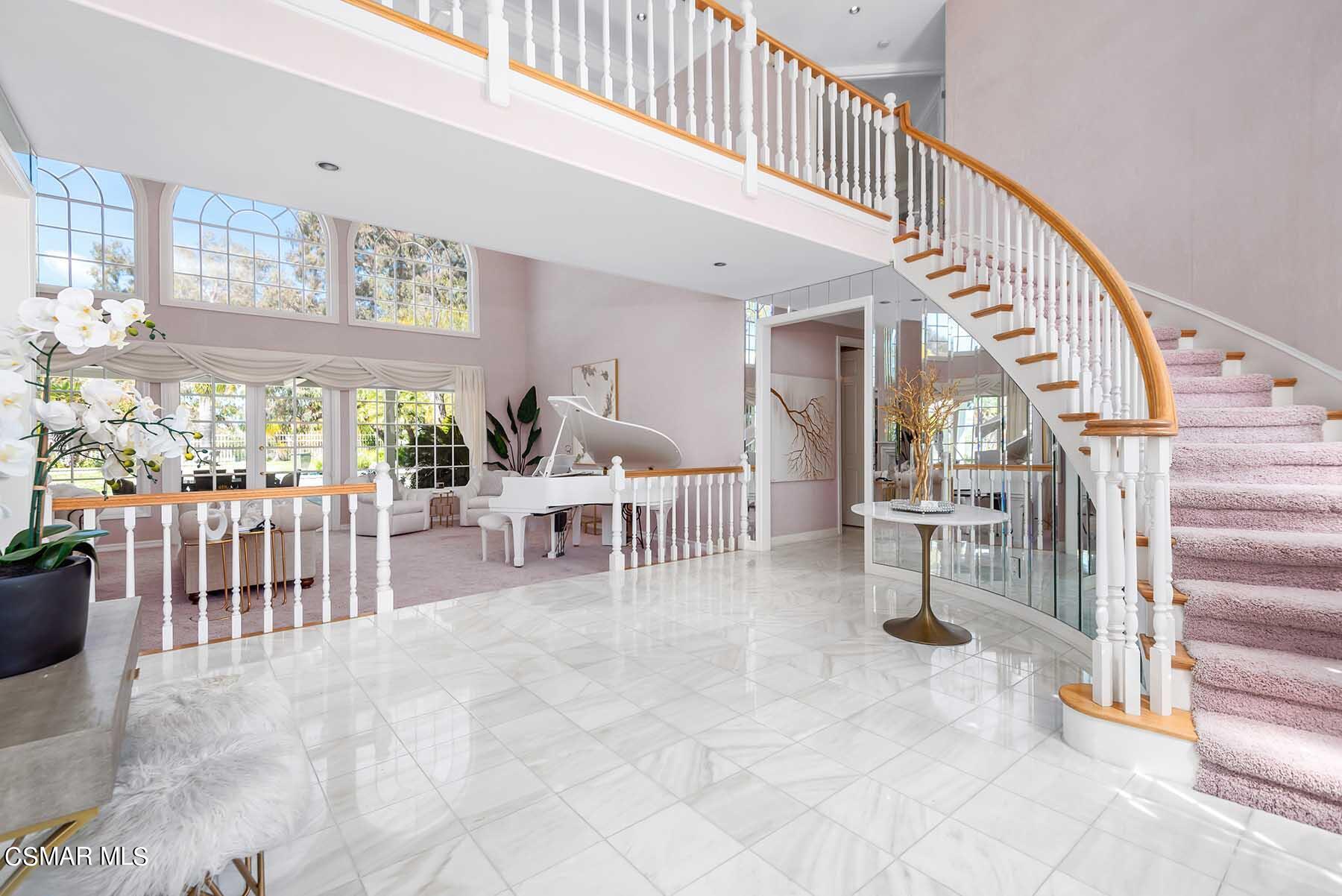 5467 Wellesley Drive Calabasas, CA 91302 - Photo 4 of 60 a view of entryway and hall with dining room