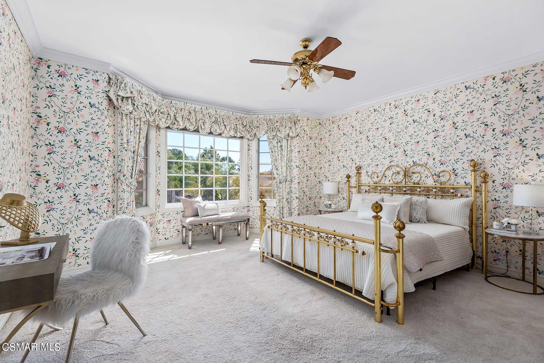 5467 Wellesley Drive Calabasas, CA 91302 - Photo 42 of 60 a bed room with a bed and a chair