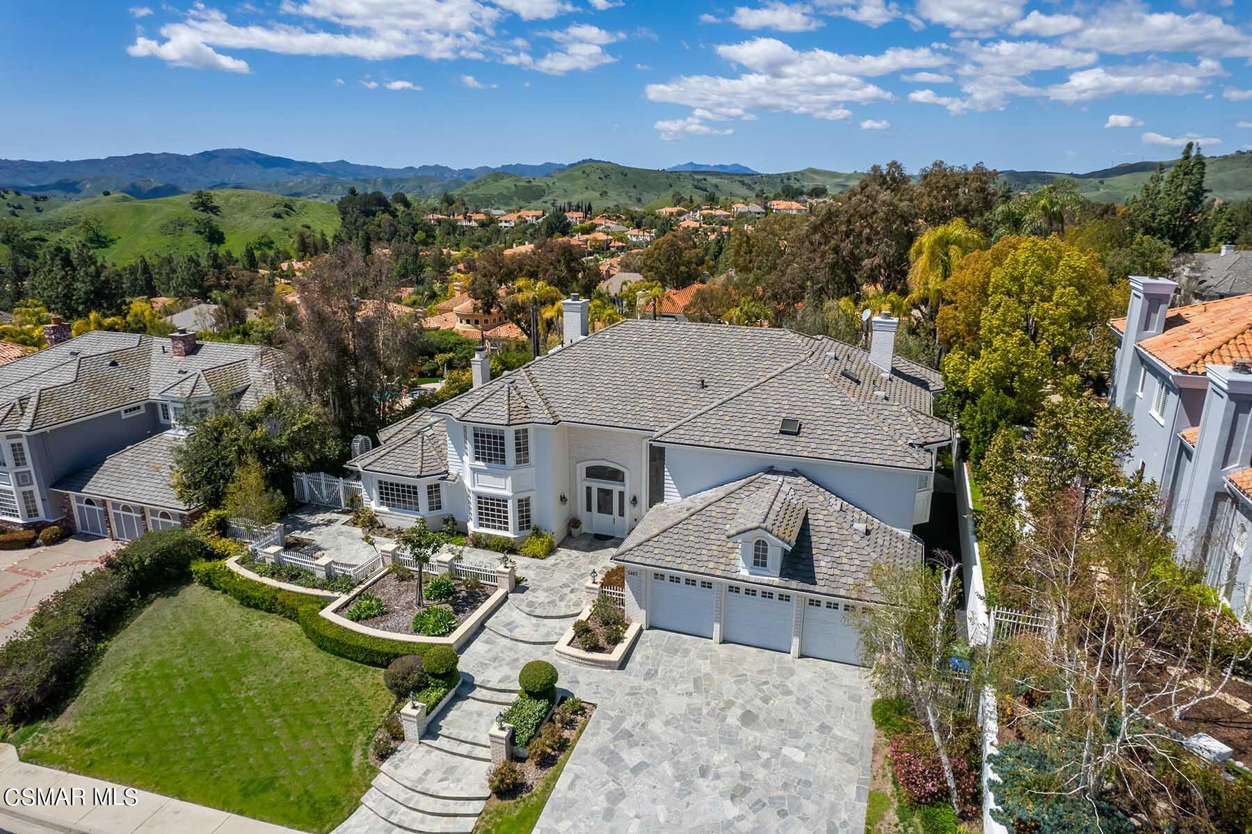 5467 Wellesley Drive Calabasas, CA 91302 - Photo 56 of 60 a view of house with garden space and mountain view in back