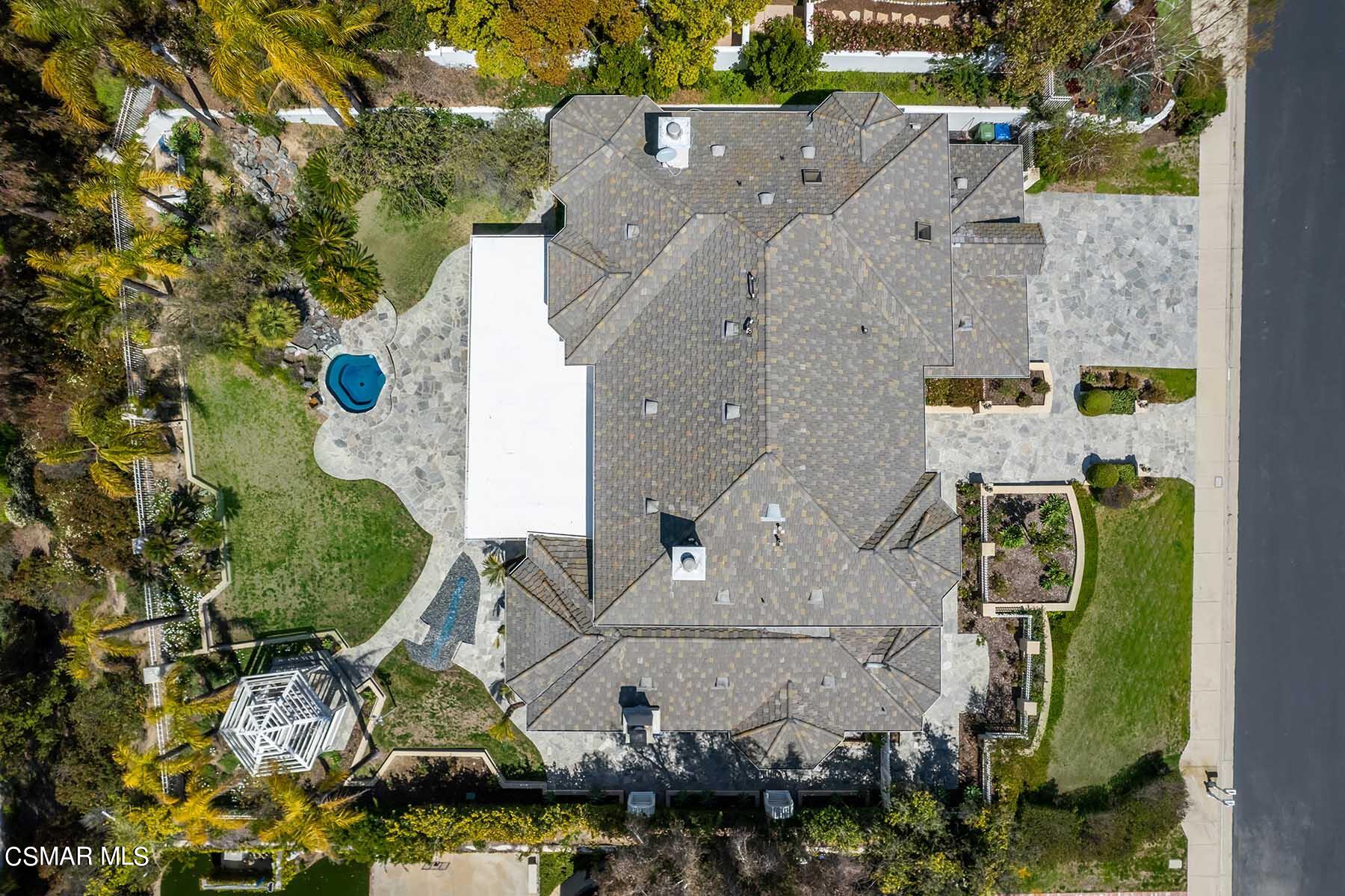 5467 Wellesley Drive Calabasas, CA 91302 - Photo 57 of 60 an aerial view of a house with a swimming pool