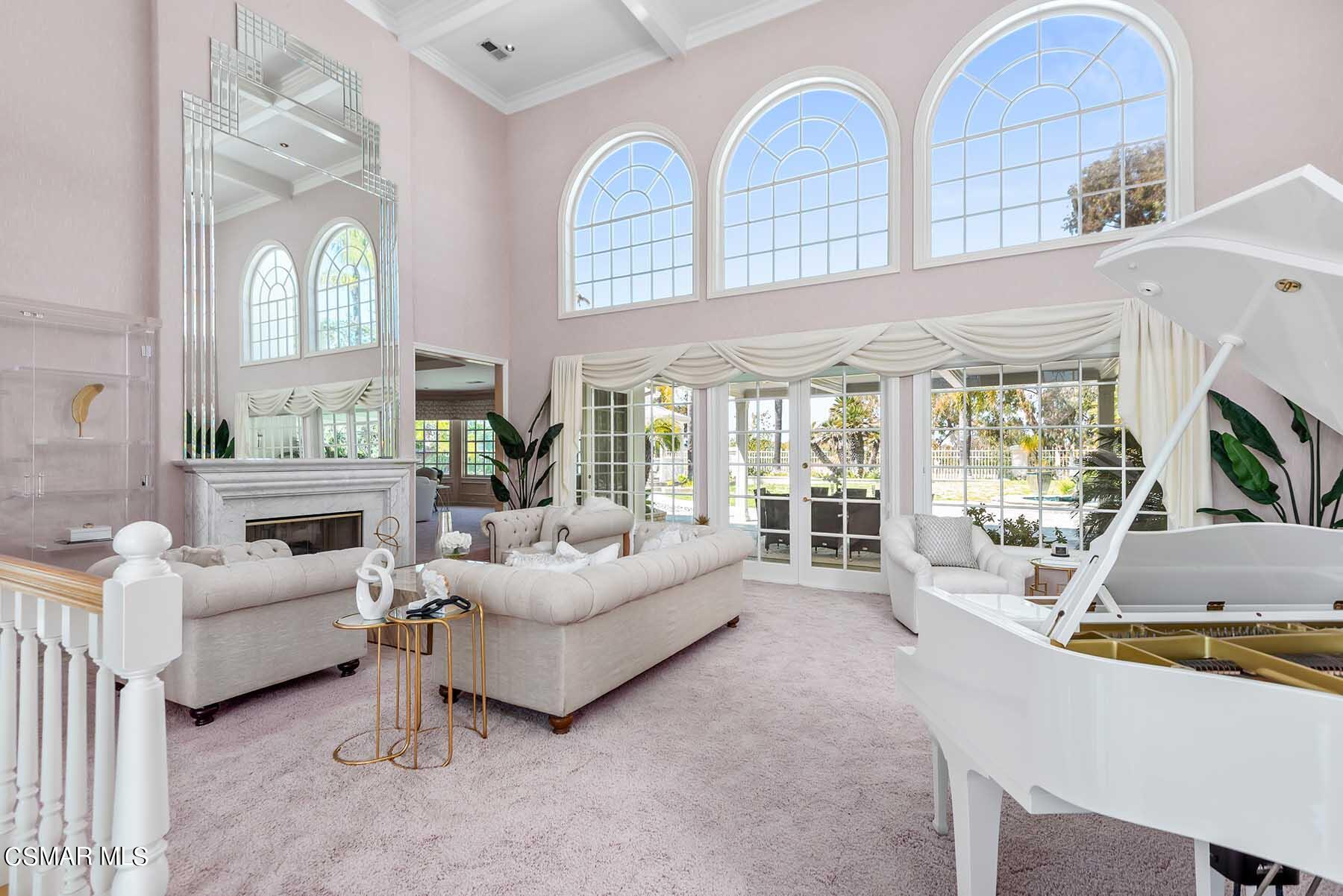 5467 Wellesley Drive Calabasas, CA 91302 - Photo 6 of 60 a living room with furniture fireplace and flat screen tv