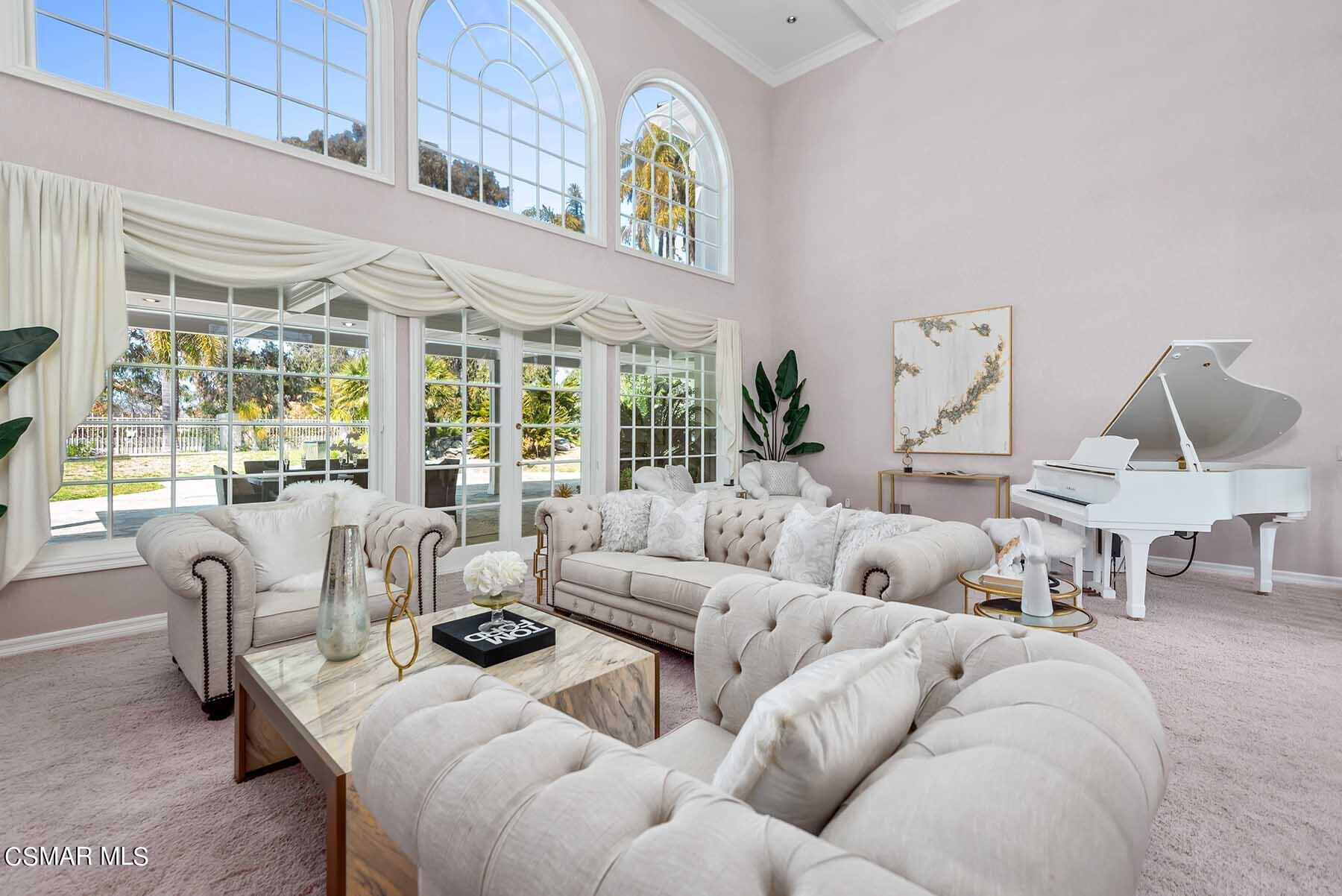 5467 Wellesley Drive Calabasas, CA 91302 - Photo 7 of 60 a living room with furniture and a large window