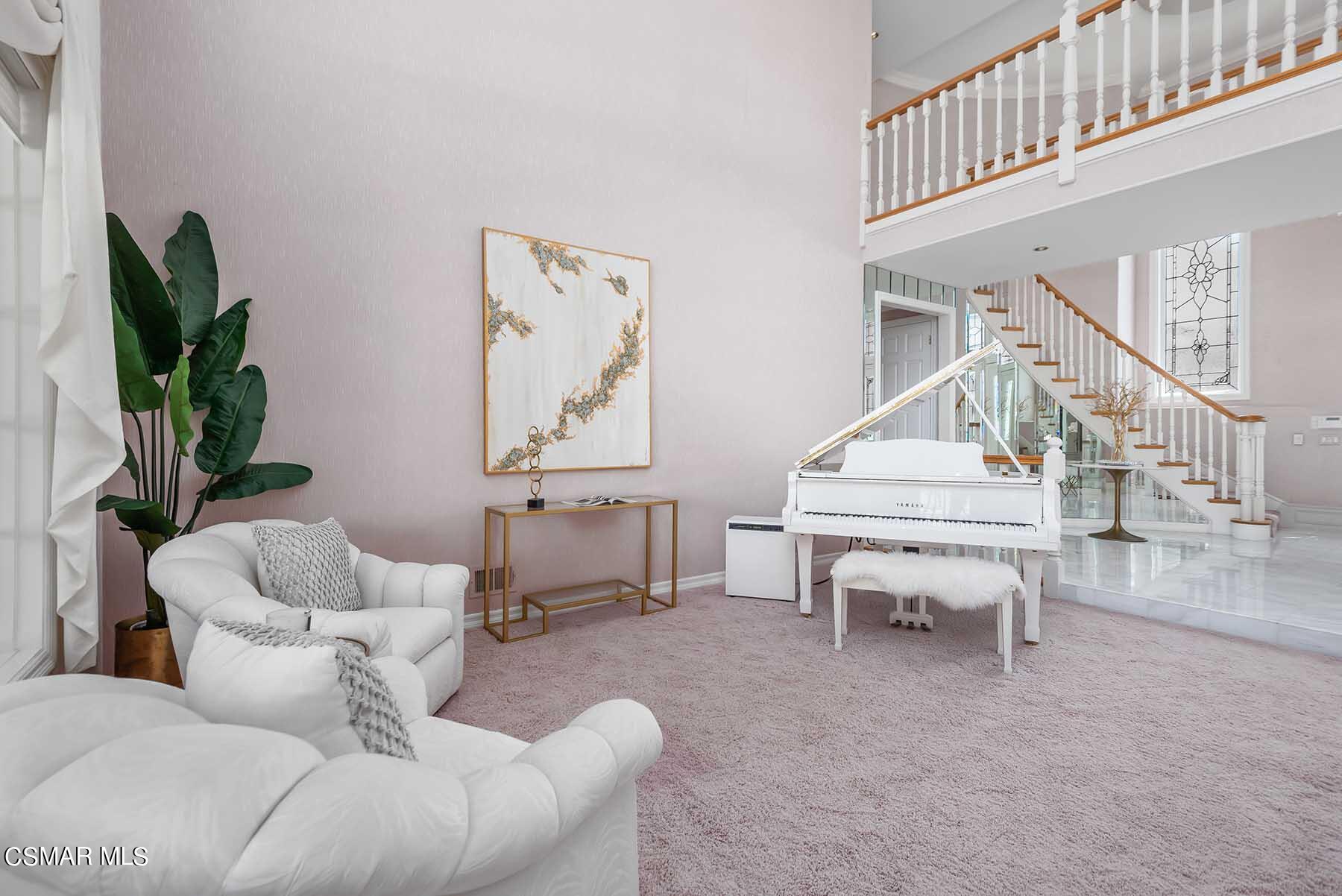 5467 Wellesley Drive Calabasas, CA 91302 - Photo 9 of 60 a living room with furniture and a wooden floor