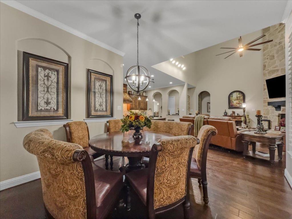 2832 Mona Vale Road Trophy Club, TX 76262 - Photo 9 of 37 a view of a dining room with furniture and wooden floor