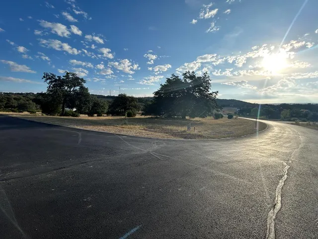 a view of a fountain in the middle of a city