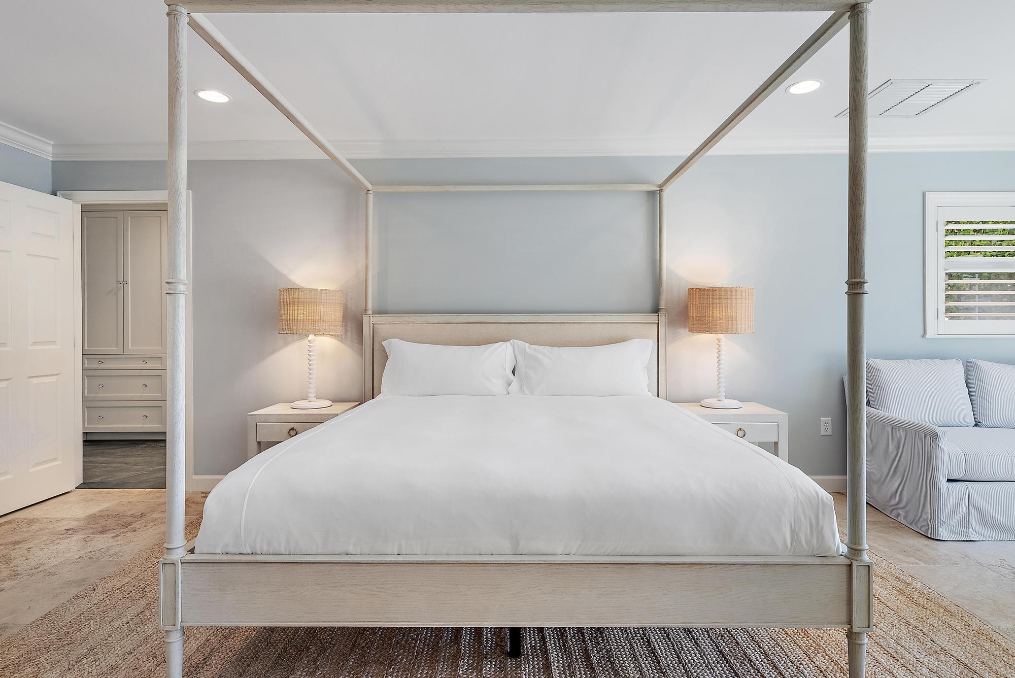 1051 Gulfstream Way Singer Island, FL 33404 - Photo 14 of 49 a large white bed in a white room