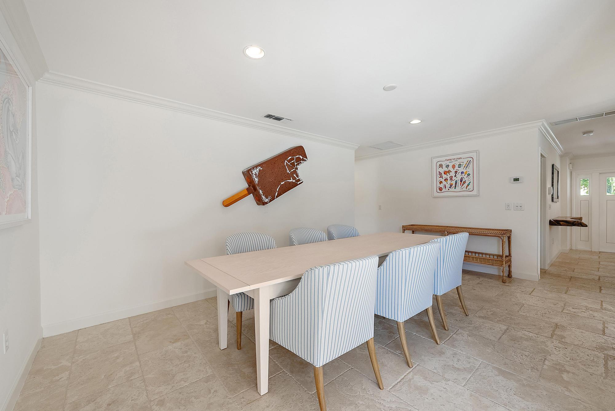 1051 Gulfstream Way Singer Island, FL 33404 - Photo 21 of 49 a view of a dining room with furniture