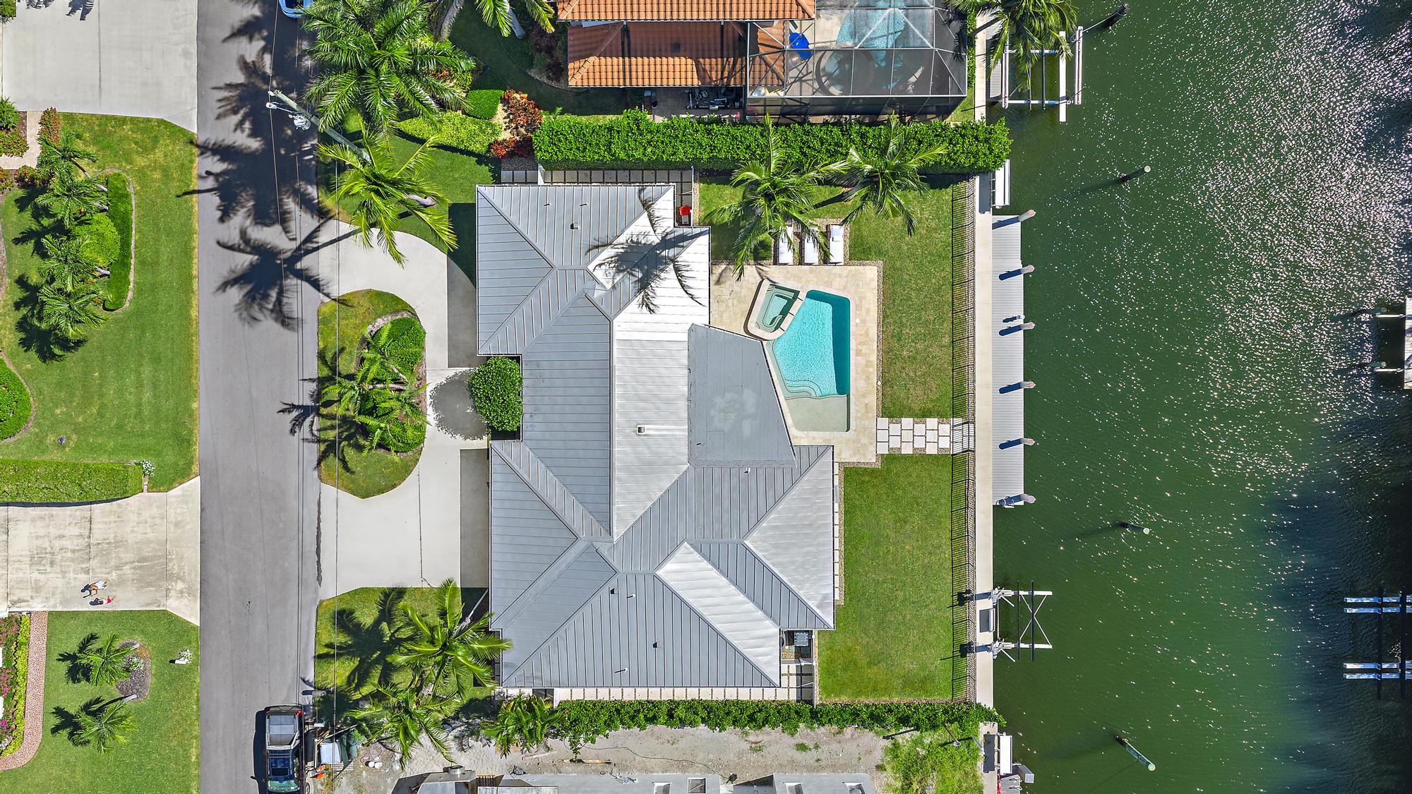 1051 Gulfstream Way Singer Island, FL 33404 - Photo 43 of 49 aerial view of a house with a garden