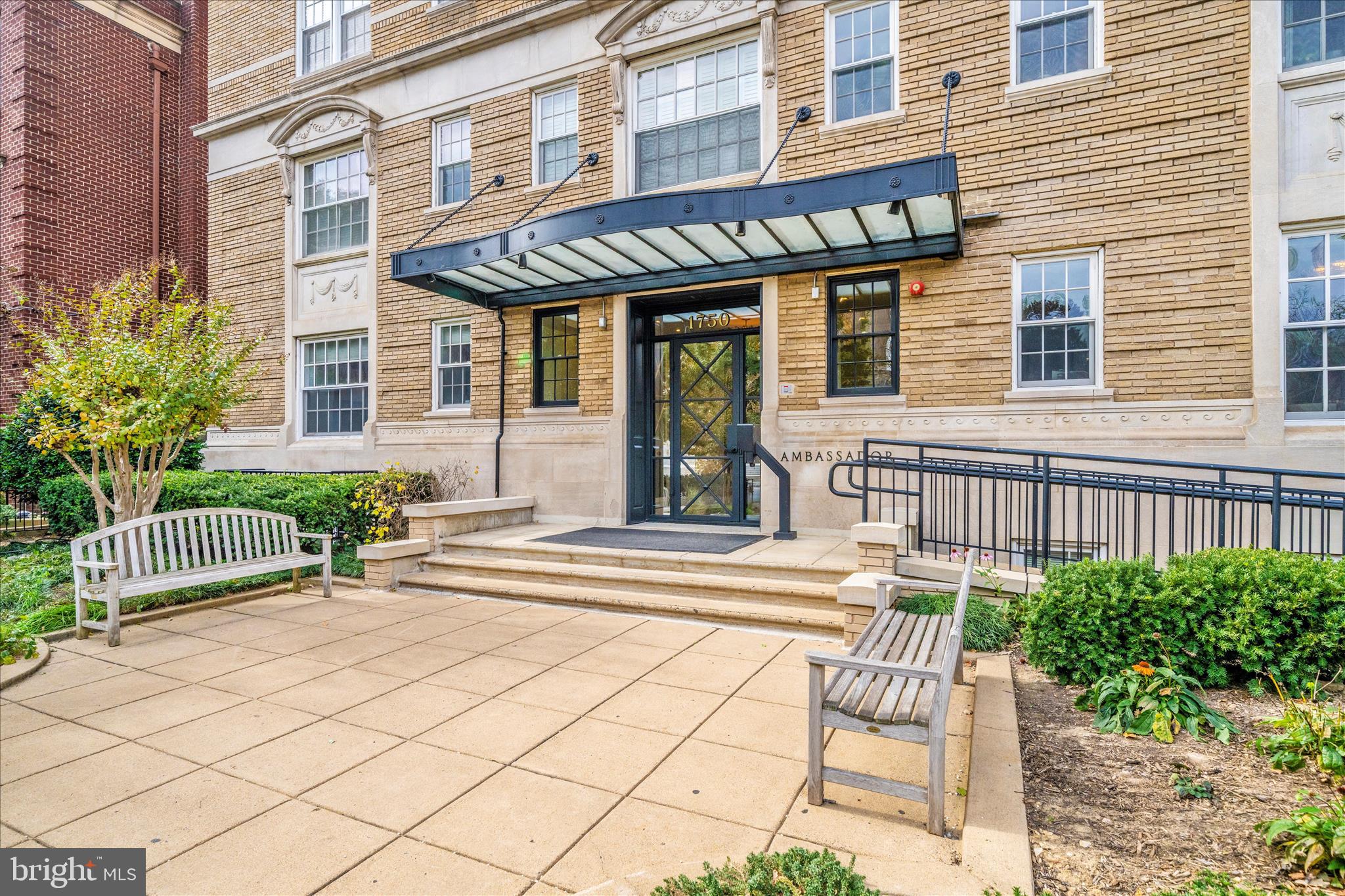 1750 16th Street Northwest, Unit 4 Washington, DC 20009 - Photo 33 of 53 a view of a house with a bench and potted plants