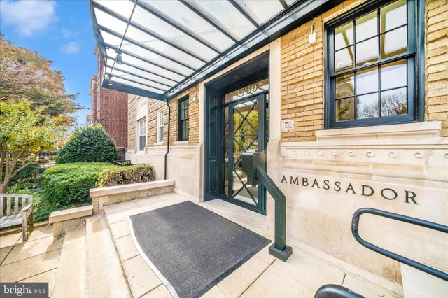 a view of a backyard with sitting area