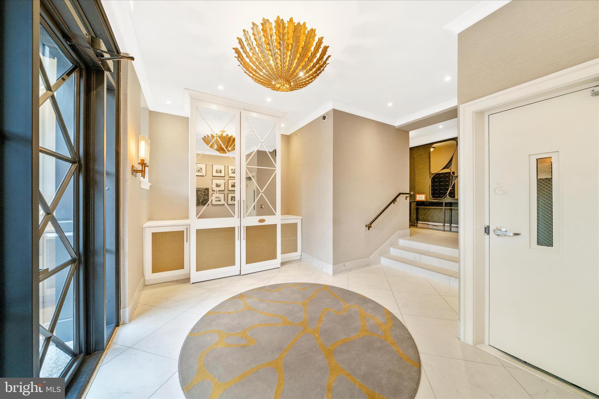 1750 16th Street Northwest, Unit 4 Washington, DC 20009 - Photo 41 of 53 view of an entryway with wooden floor and a living room