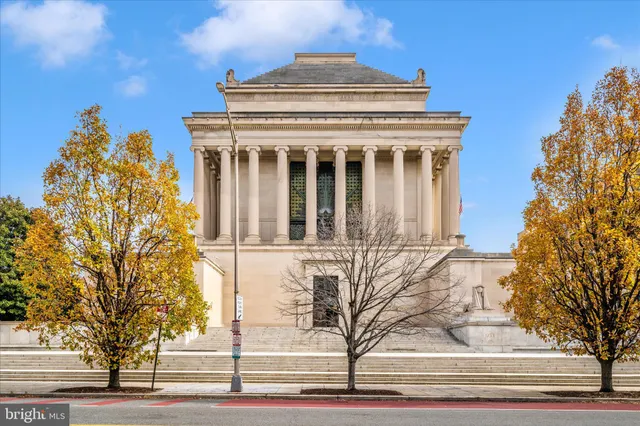 a view of a building along a street