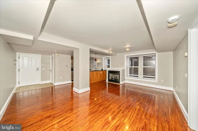 a view of a livingroom with wooden floor