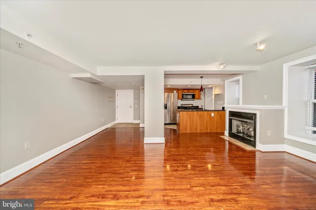 a view of living room with furniture and flat screen tv