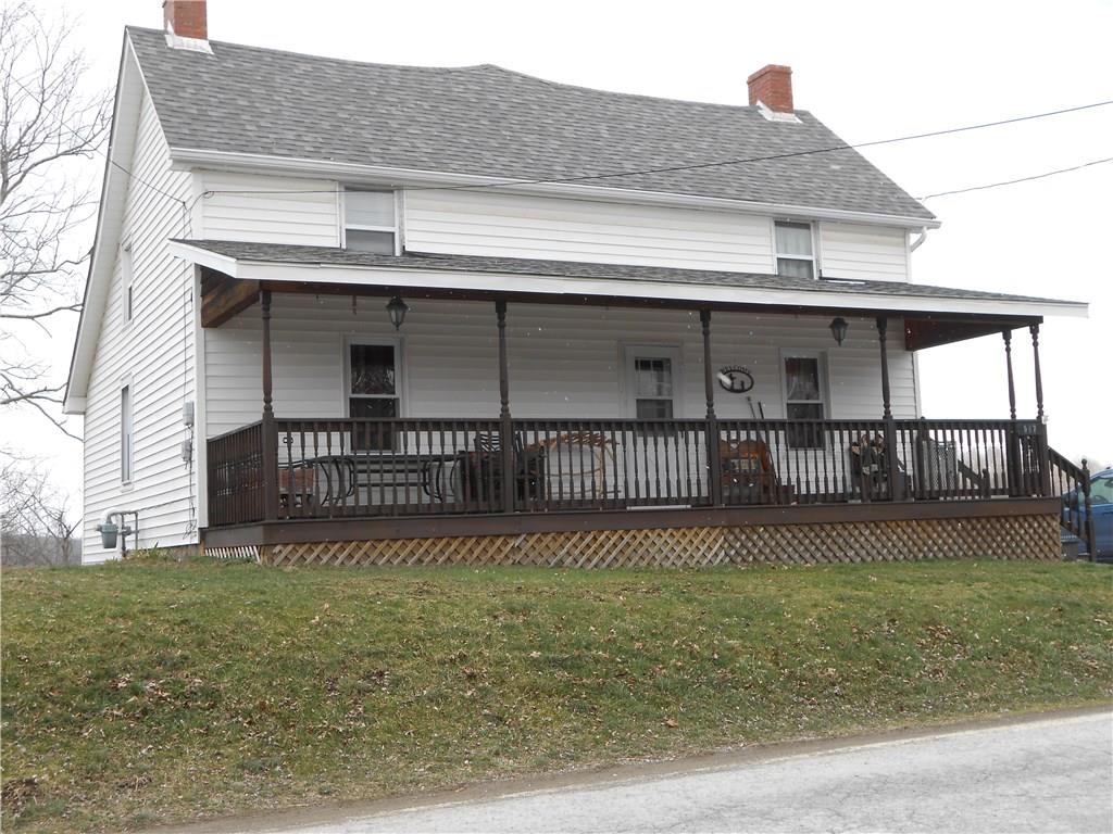 Country porch and all new shingles.