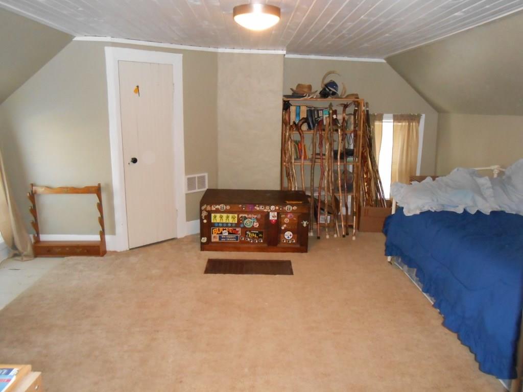 587 Amity Ridge Road Amity, PA 15311 - Photo 16 of 25 2nd bedroom with wood ceiling.