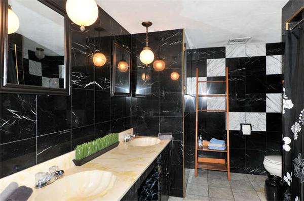 13 Town Line Road Burlington, MA 01803 - Photo 11 of 22 a bathroom with a sink a mirror and shower