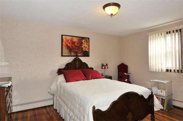 13 Town Line Road Burlington, MA 01803 - Photo 13 of 22 a bedroom with a bed and a window