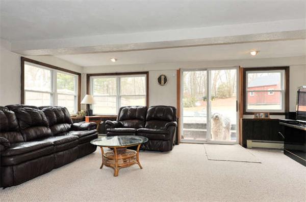 13 Town Line Road Burlington, MA 01803 - Photo 17 of 22 a living room with furniture and a large window