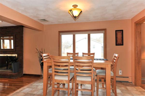 13 Town Line Road Burlington, MA 01803 - Photo 3 of 22 a view of a dining room with furniture and a chandelier