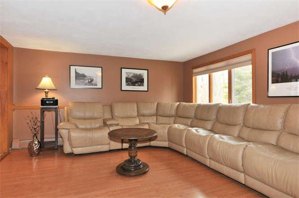 13 Town Line Road Burlington, MA 01803 - Photo 4 of 22 a living room with furniture a rug and a large window