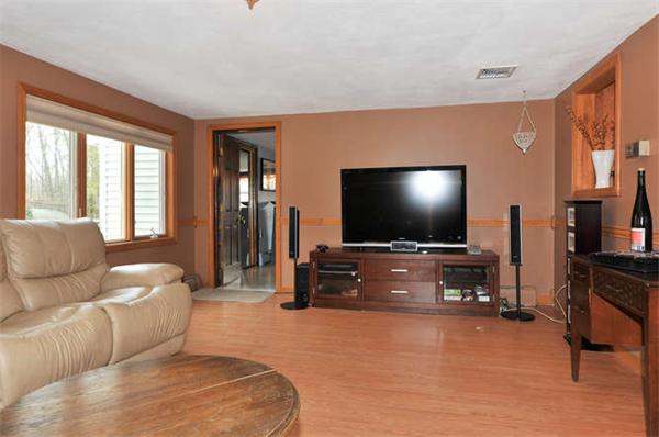 13 Town Line Road Burlington, MA 01803 - Photo 6 of 22 a living room with furniture and a flat screen tv