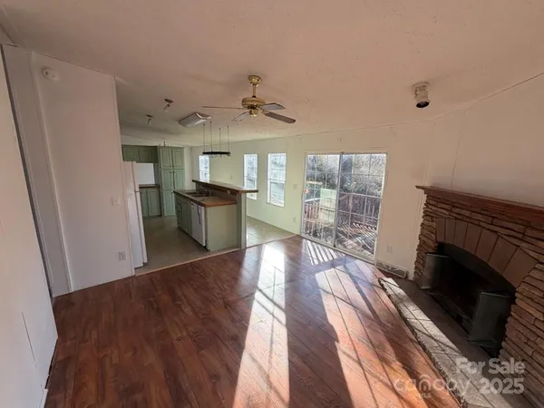 a view of a electric appliances in kitchen and empty room
